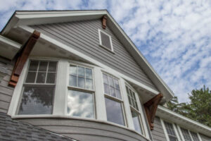 closeup view of a home's siding and large windows